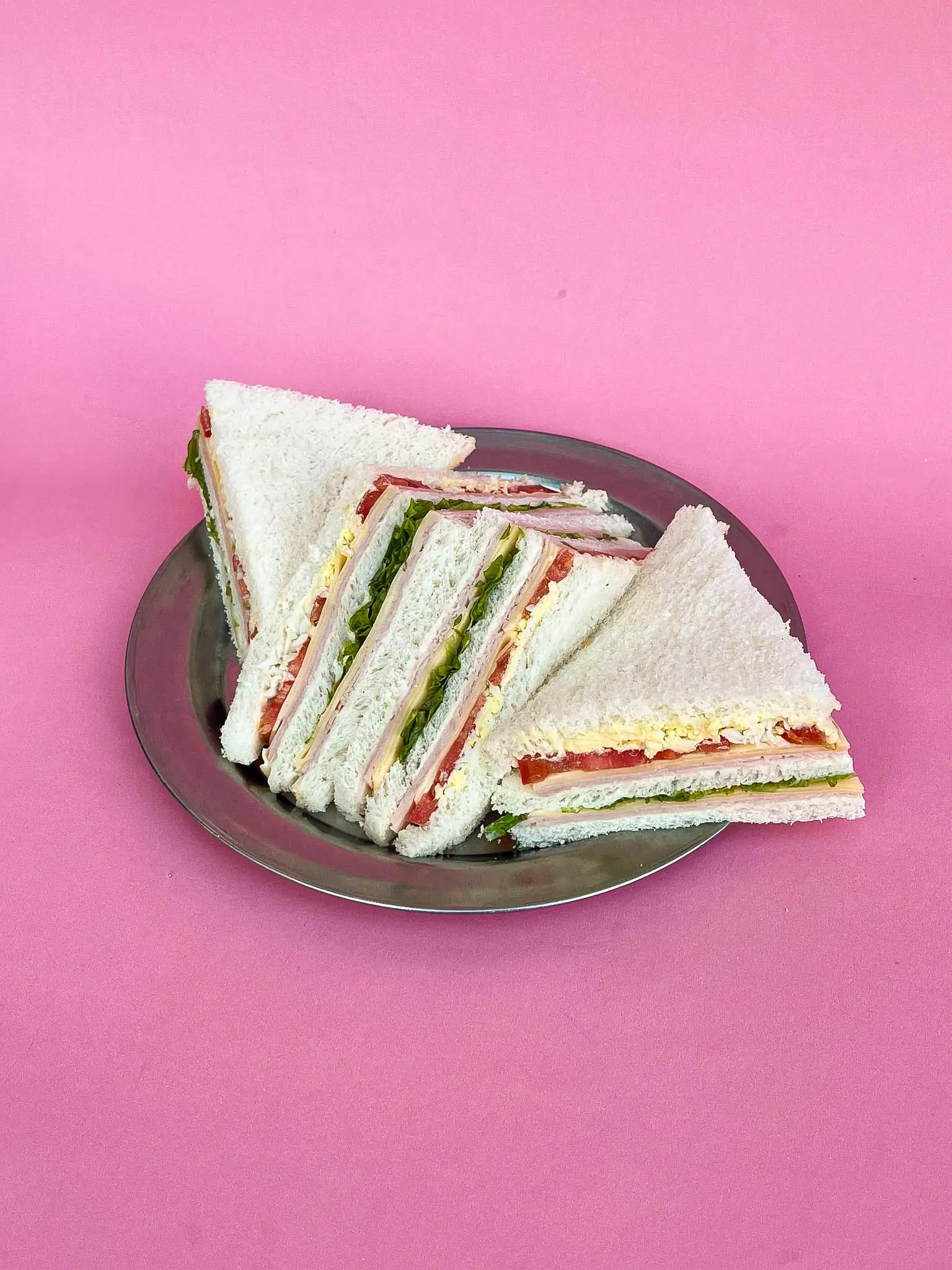 Sándwich triple de jamón cocido y queso