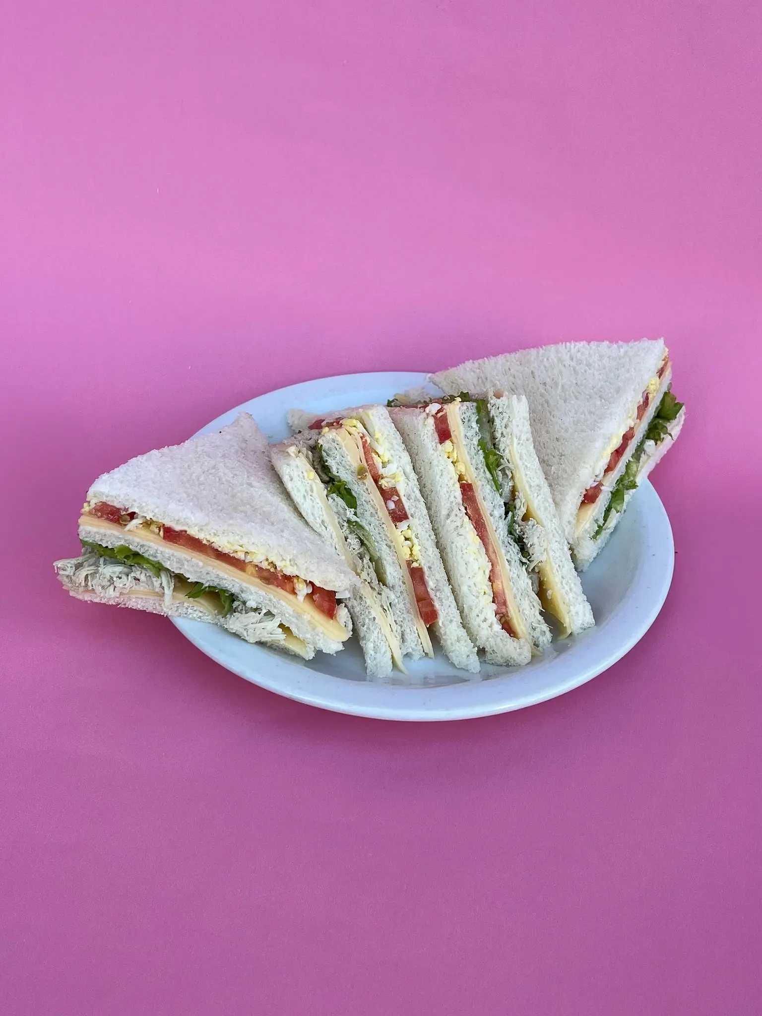 Sándwich triple de pollo