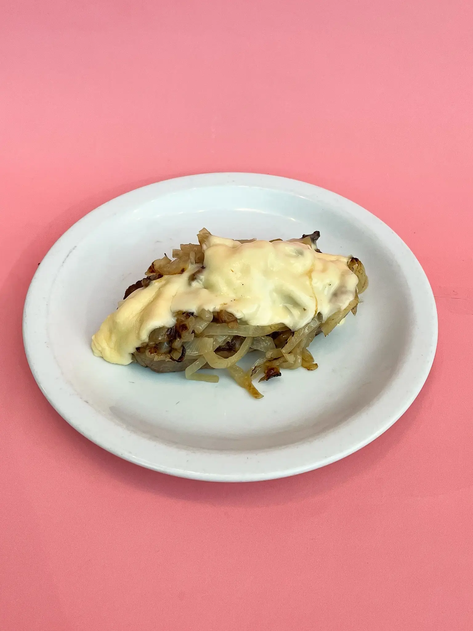 Lomo cebollado al gratén
