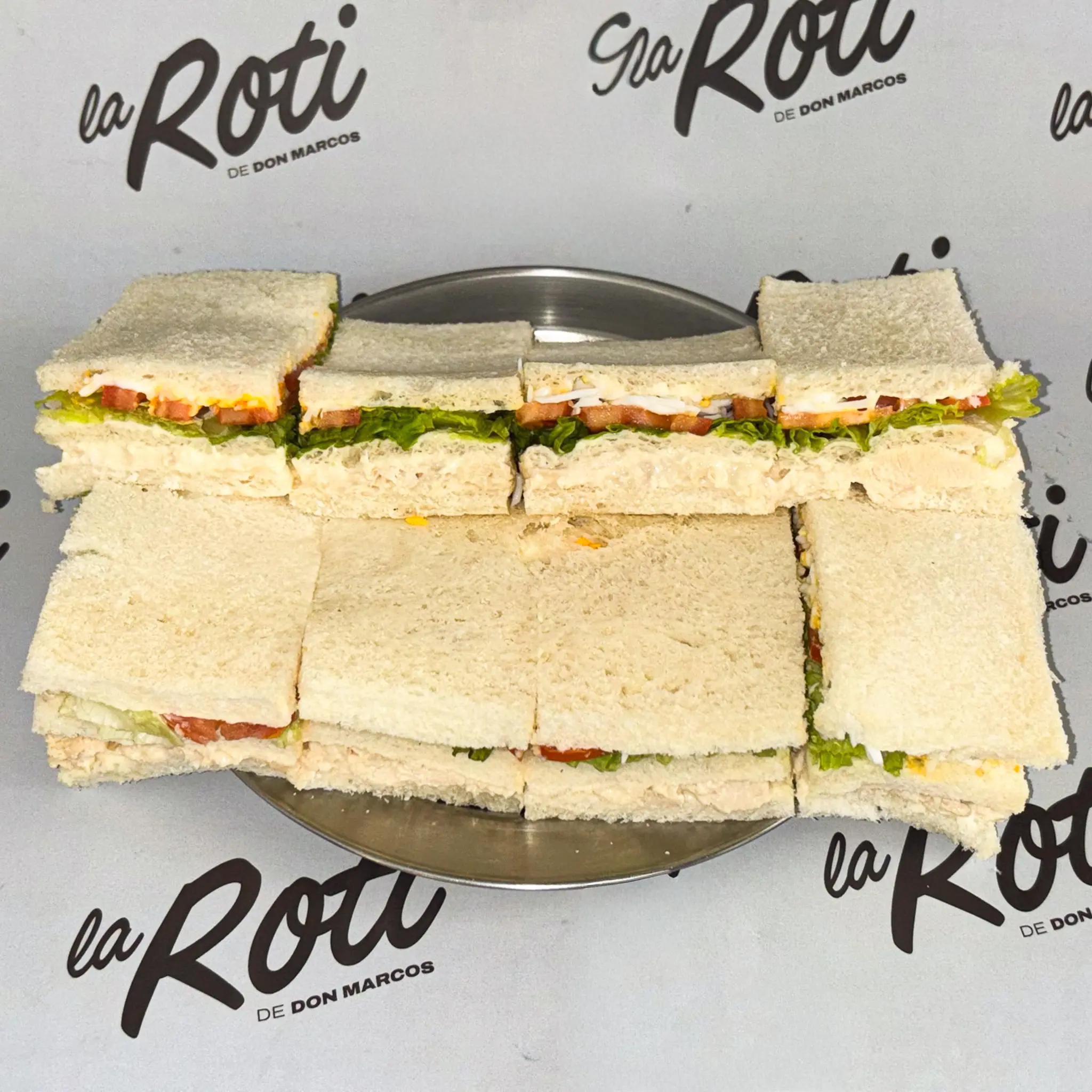Sándwich triple de pollo