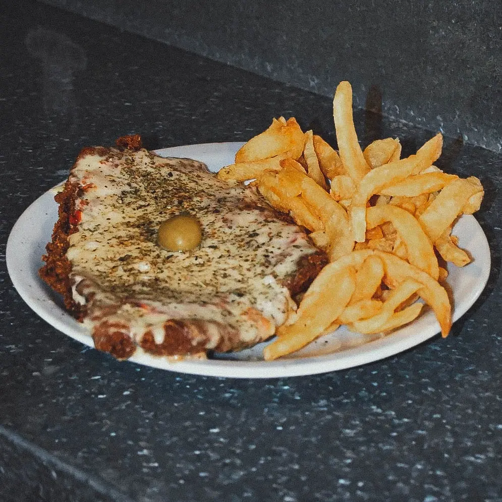 Milanesa de carne a la pizza
