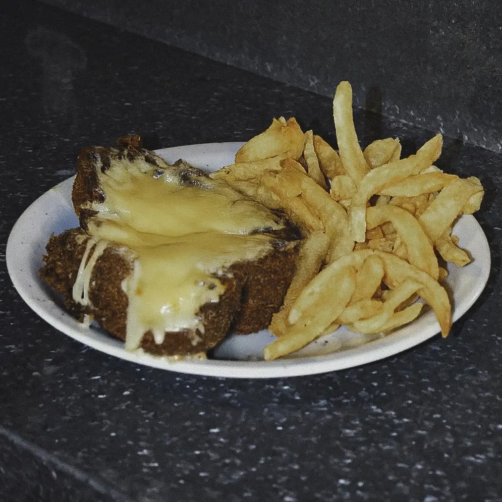 Milanesa de pollo a la suiza