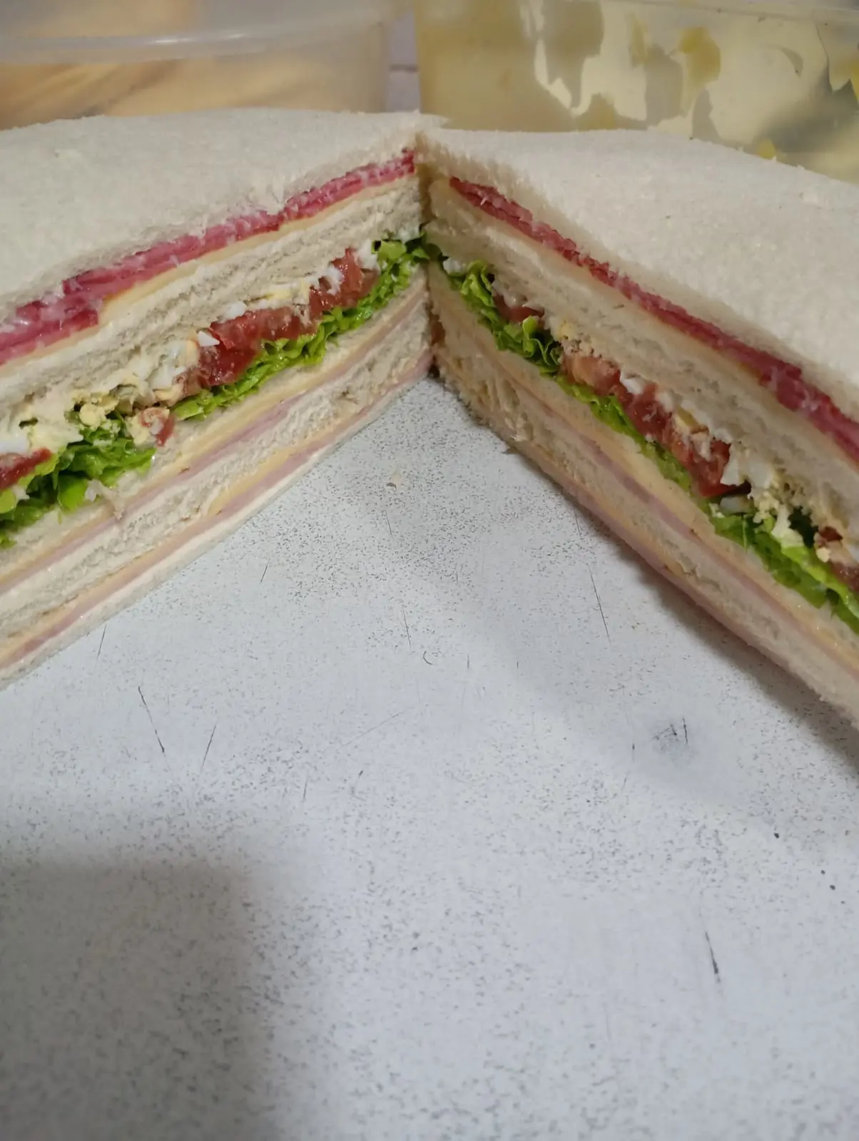 1 mixto de jamon y queso, 1 mixto de milan, 1 triple de jamon y queso