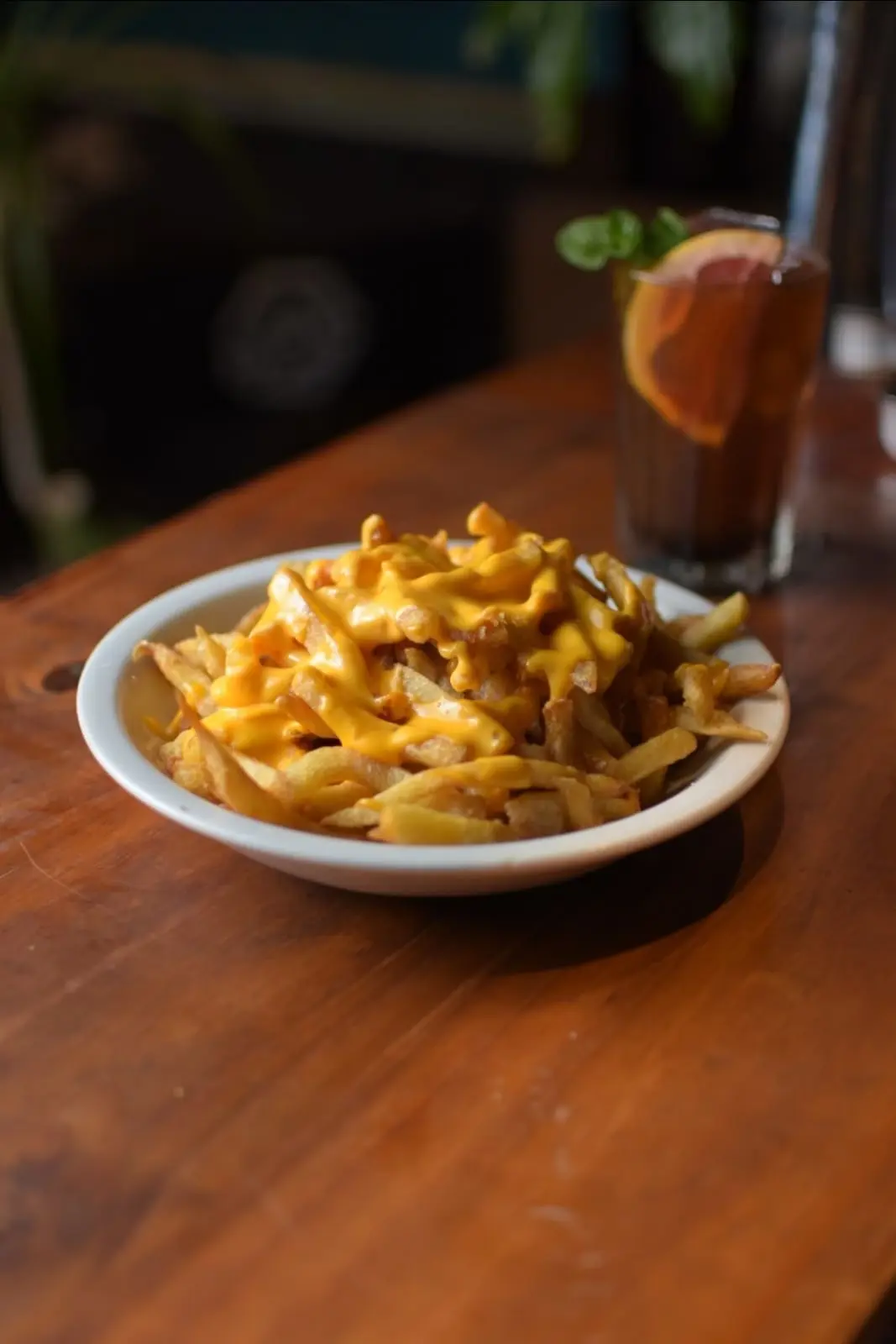 Papas fritas con cheddar