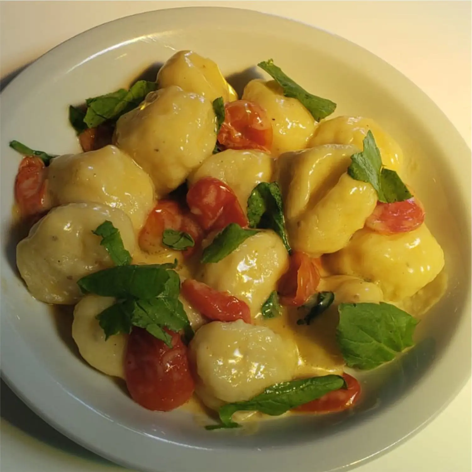 Ñoquis de papa rellenos con muzza